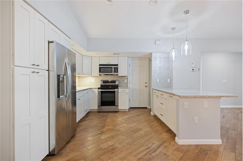 Kitchen- stainless steel appliances, quartz countertops, soft close cabinets, and more!