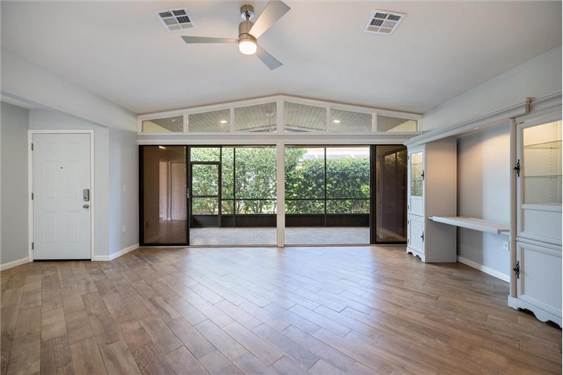 Great Room with sliders that open to the screened in Lanai
