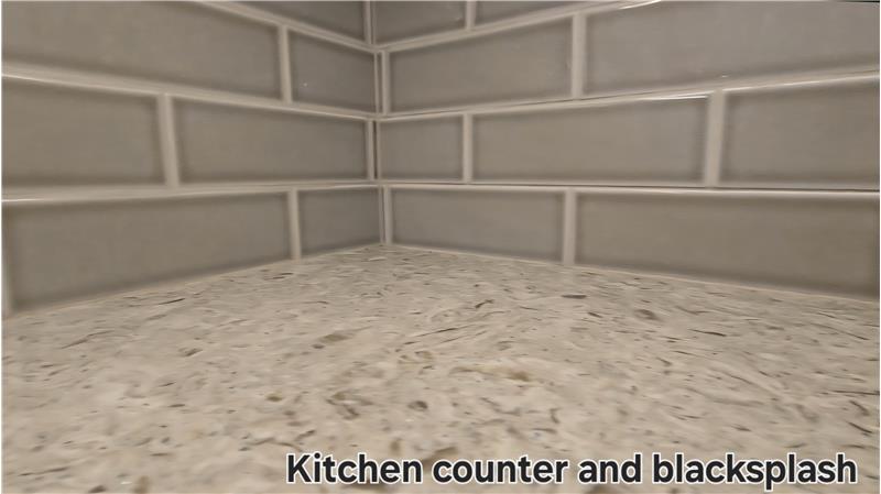 Quartz Counter and Tile Backsplash in Kitchen