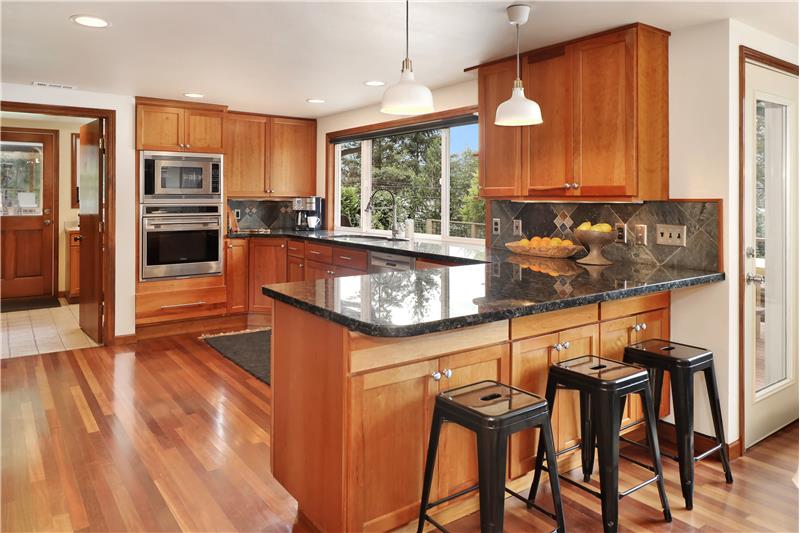 Cherry Wood cabinets & granite counter tops