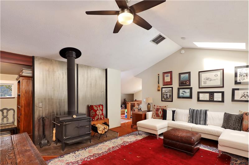 Upstairs bonus room with wood stove