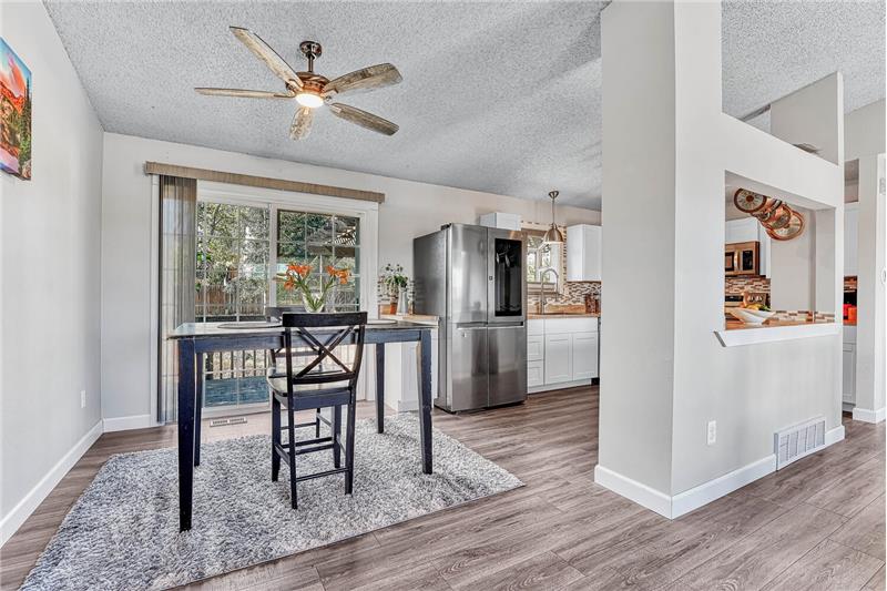 The Dining Area flows into the Updated Kitchen