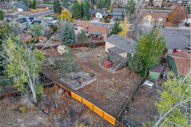 Aerial view of fenced backyard