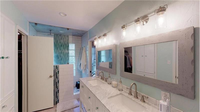 Heated floors, marble counters, and custom shower!