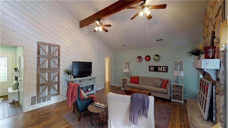 Exposed wood beams add charm and style