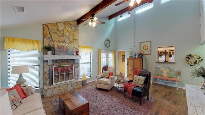 Vaulted ceilings, beautiful stone fireplace