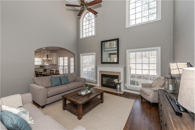 Large windows provide wonderful natural light and views of the wooded back yard.