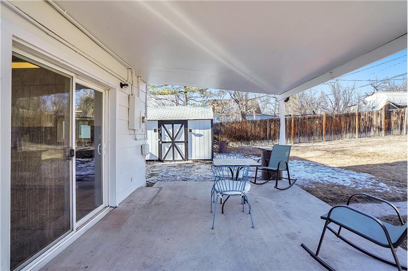 The Kitchen has a slider out to the covered patio