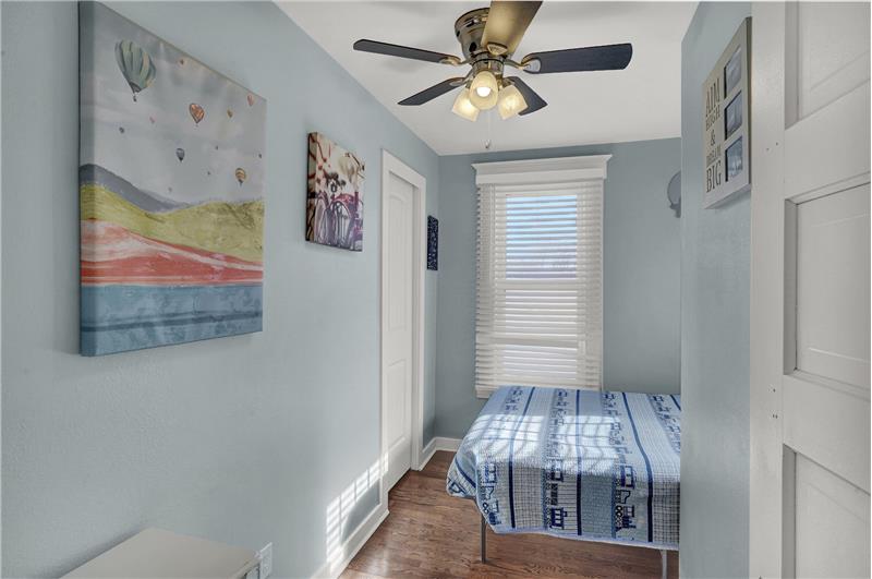 Upper level Bedroom #2 with lighted ceiling fan