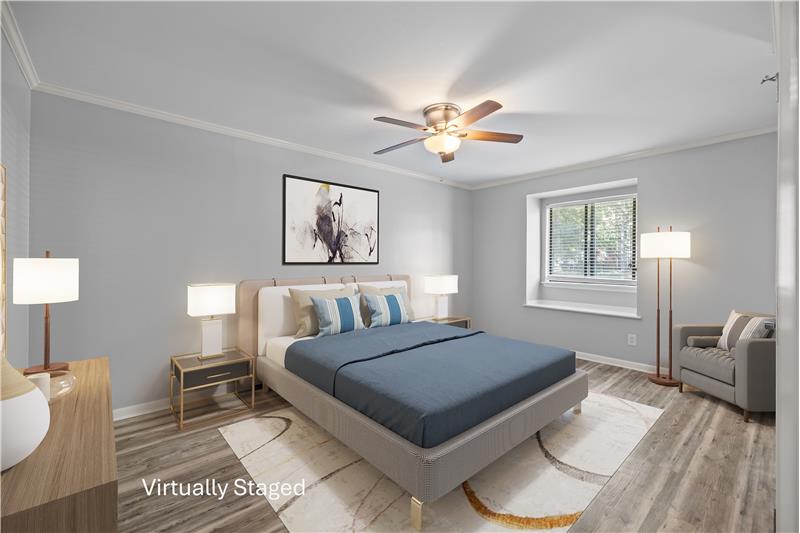 Spacious primary suite with room for king-size bed