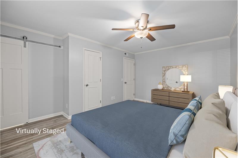 Primary bedroom provides privacy and a great retreat