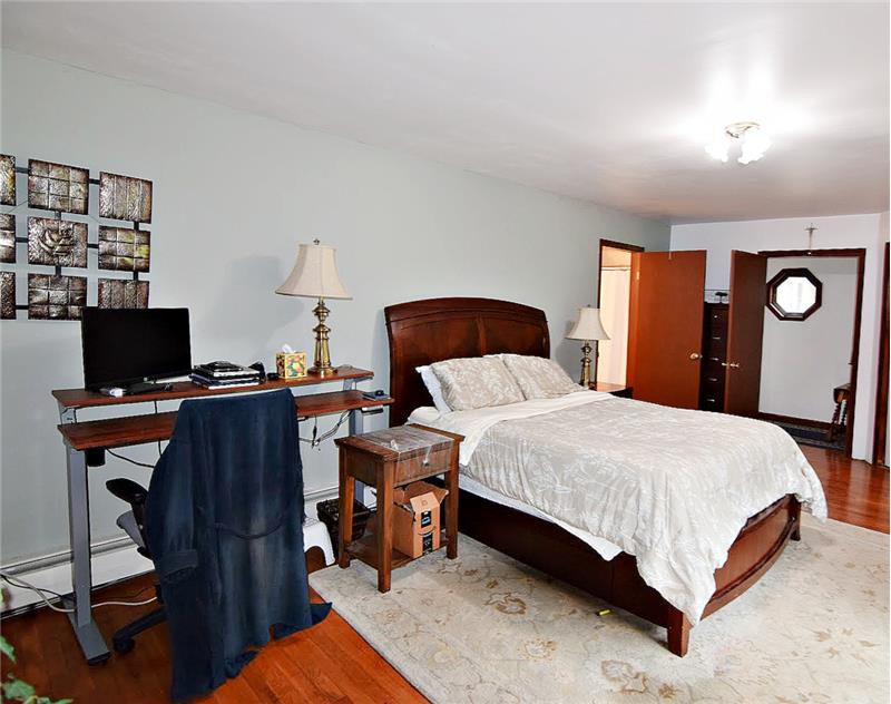 Primary bedroom in four bedroom unit