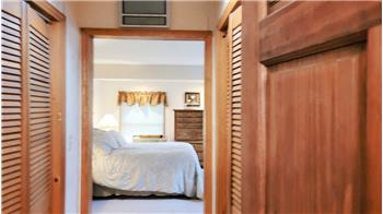 Closets located between the bedroom and primary bathroom