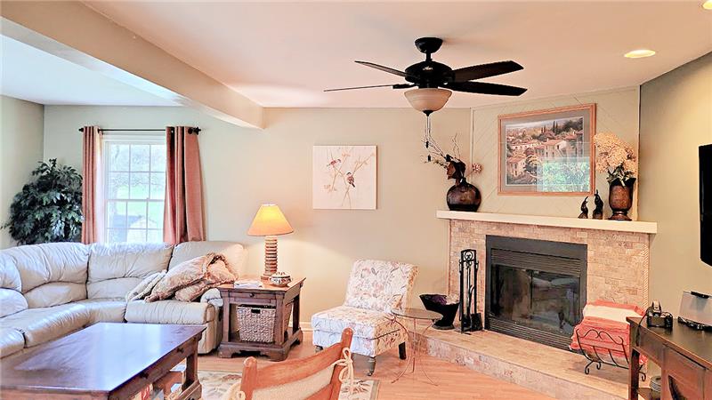 Living room with fireplace  in two bedroom  unit