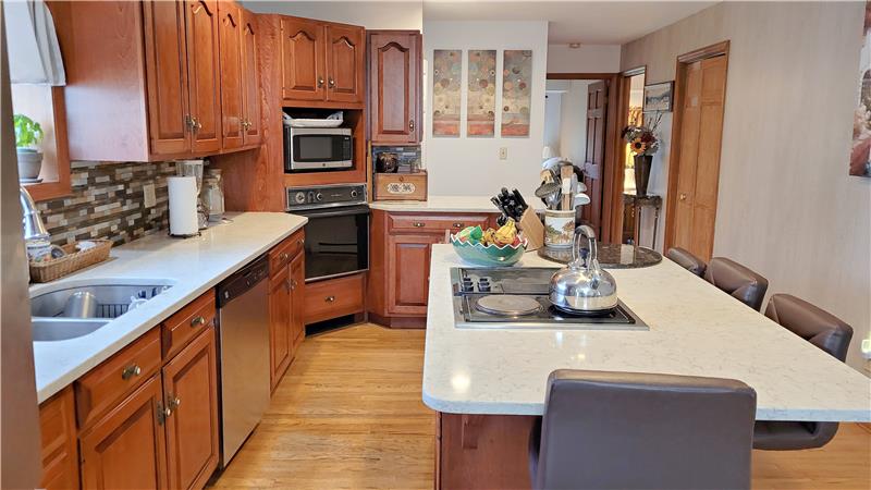 Kitchen isle with quartz counter