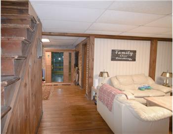 Sitting area  = basement - Four-bedroom  unit has access to the basement.