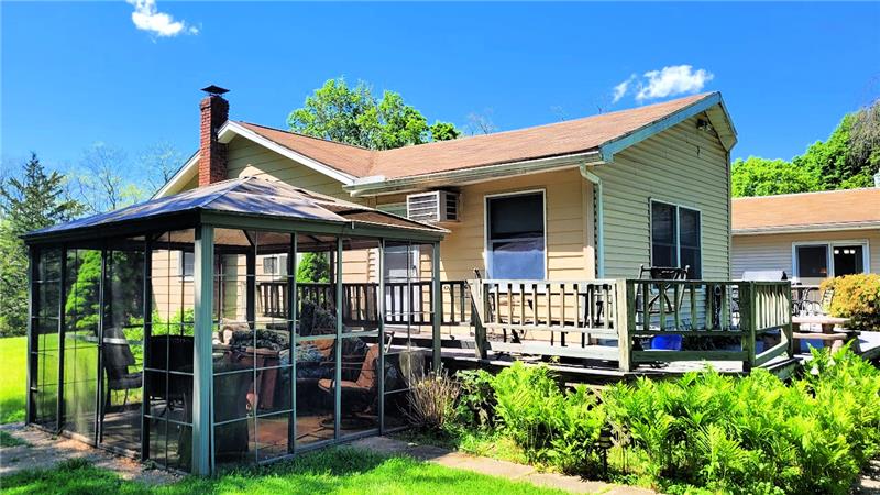 A view of the expansive deck facing the backyard.
