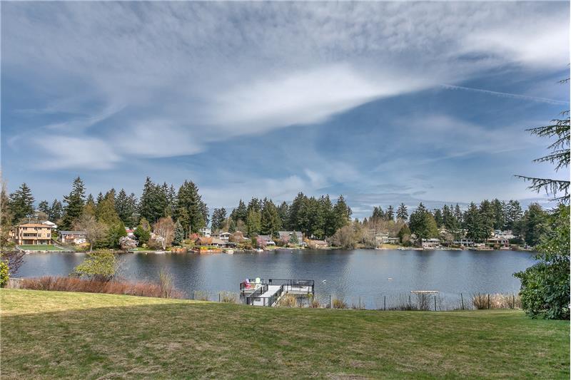 The lake, lawn and private dock are right outside your door!