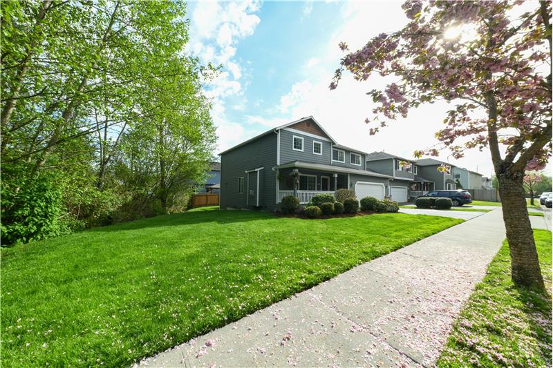 Home showing large side yard. This is the side that is adjacent to the NGPA community greenbelt.