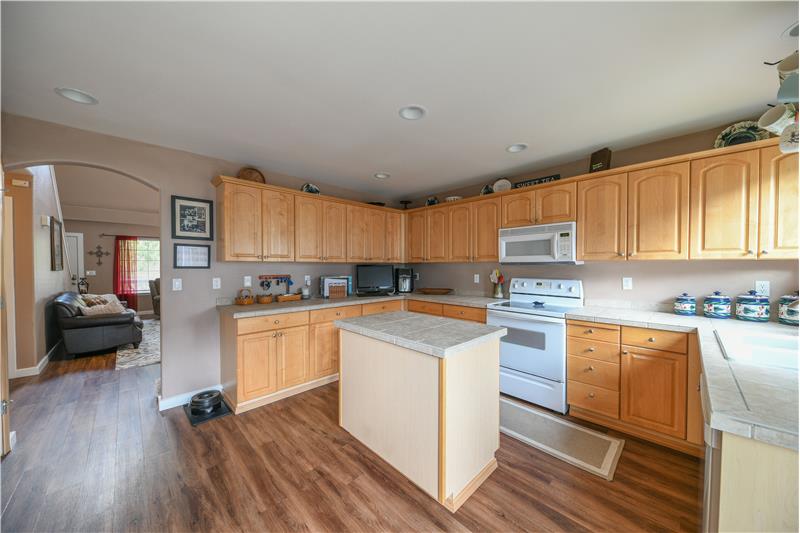 Kitchen as seen from the sliding glass door. Tons of cabinet space!