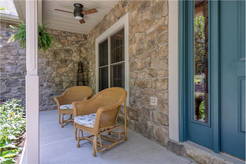 Covered front porch with ceiling fan