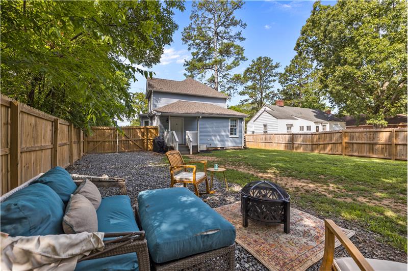 Fully fenced back yard provides privacy and security