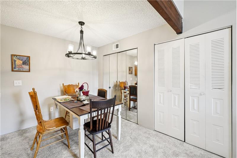 Dining room. (Not shown is washer & dryer behind the mirrored bifold doors)