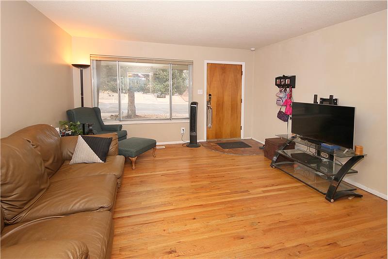 Living room with hardwood flooring