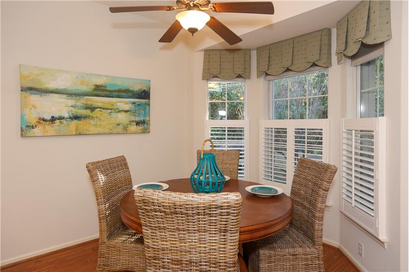 Lovely views of the woods from the bay window in the eat-in kitchen/casual dining area.