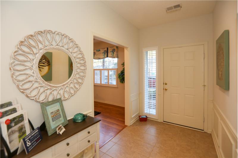Foyer with wainscoting.