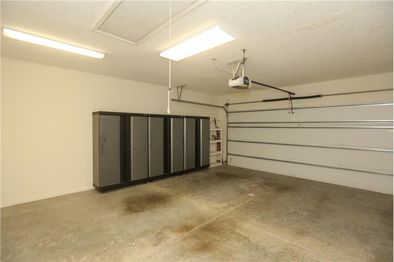Kobalt garage cabinets convey with the sale, new garage door & bluetooth door opener add value.