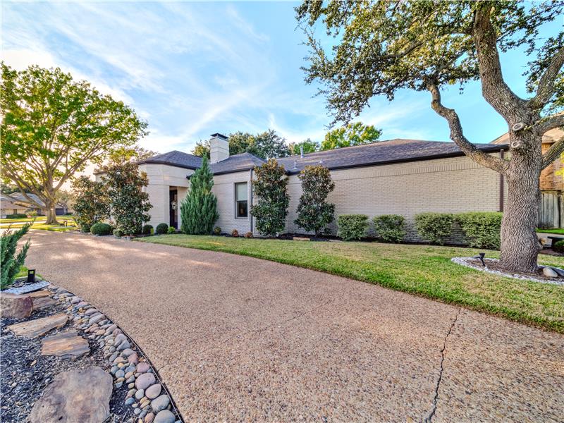 View of front side of the house with a front yard