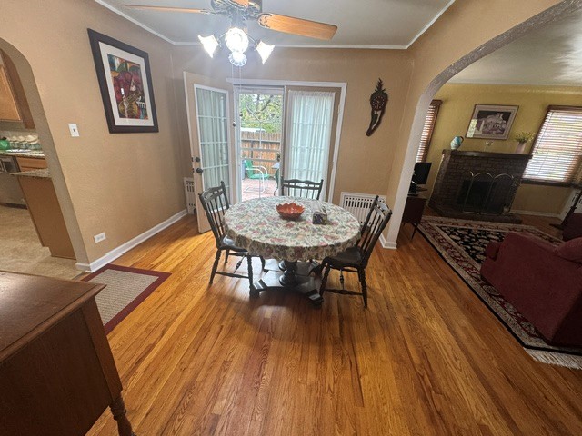 Dining room, open to living room at right, kitchen at left