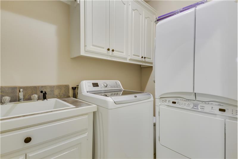Laundry room features built-in sink
