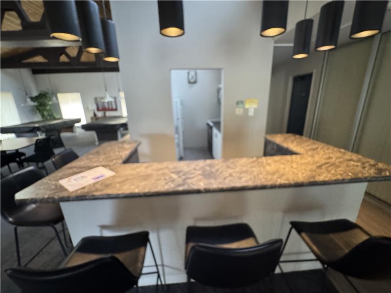 Kitchen and bar seating in clubhouse