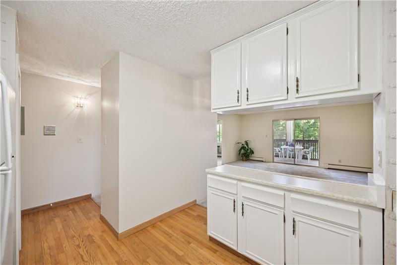 Kitchen view toward foyer and living/dining room
