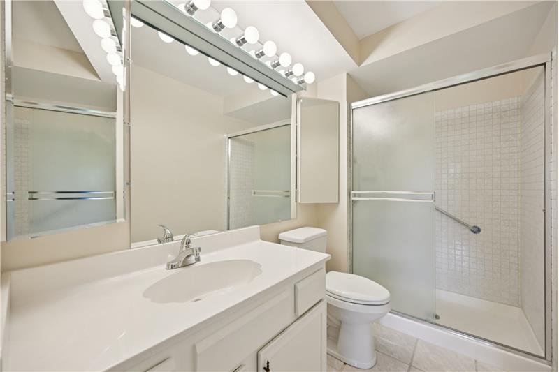 Ensuite 3/4 bath for primary suite