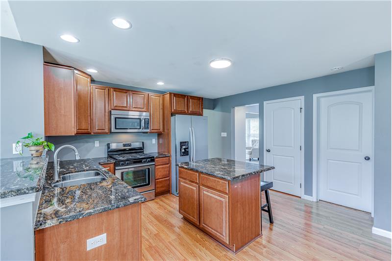Open kitchen with granite countertops