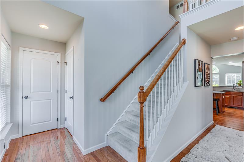 Foyer with coat closet and powder room