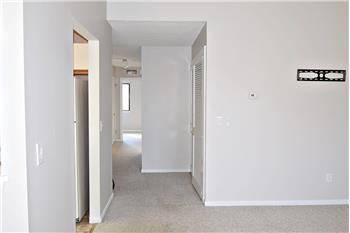 Living room area located in front of the kitchen
