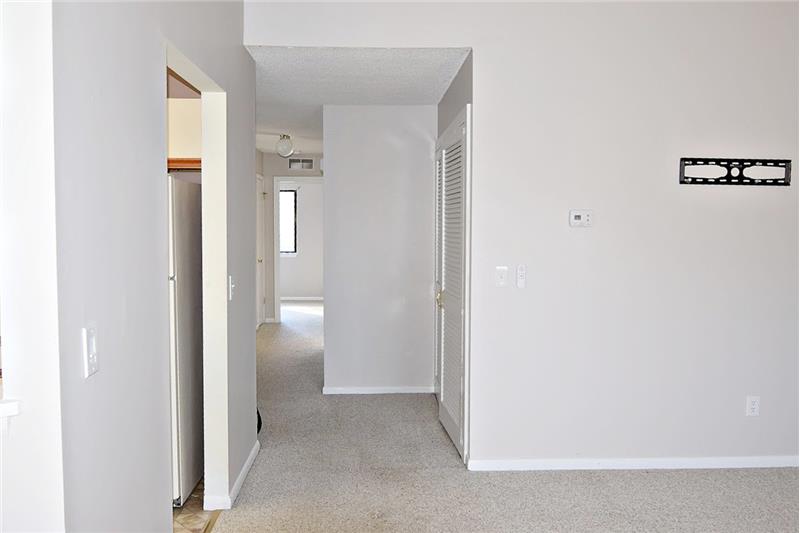 Living room area located in front of the kitchen