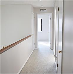 There is a hall closet for storage