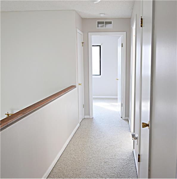 There is a hall closet for storage