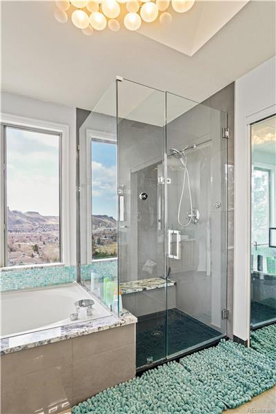 Both walk-in shower and soaking tub in primary suite
