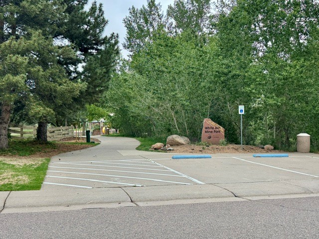 Subdivision contains White Ash Mine Park, maintained by City of Golden