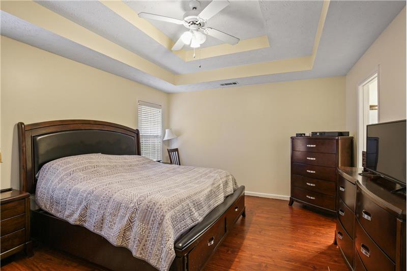 Primary suite with double trey ceiling