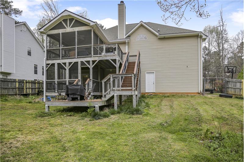Rear view, screened porch on lower level as well