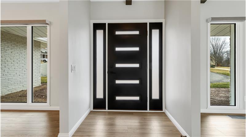 Entry foyer with frosted sidelights