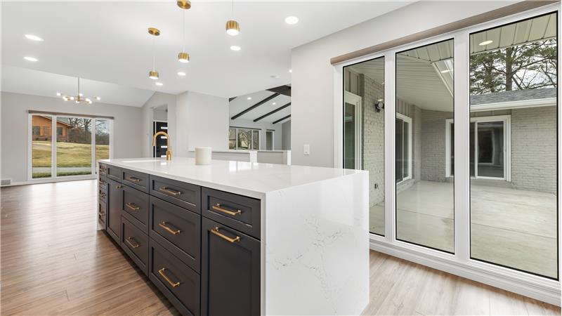 This open floorplan shows the view to the replaced and enlarged 24x21 Patio, dining room, great room.