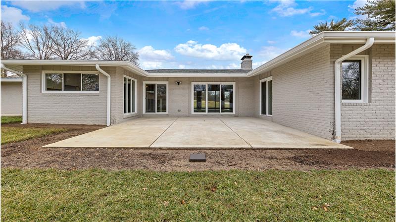 24x21 concrete patio with access from the Great Room and Primary Bedroom